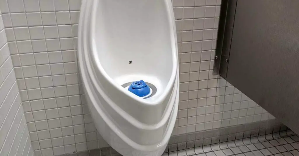 How Does a Waterless Urinal Work? (Explained)