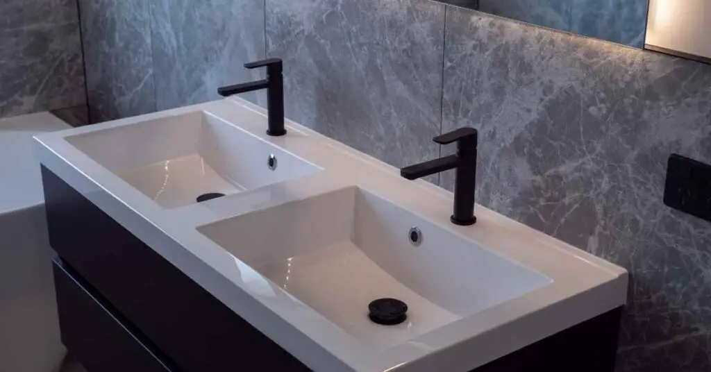 Why Are Bathroom Sinks So Low? (Explained)